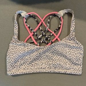 Lululemon Cream/Dark Grey/Hot Pink Free to be Wild Bra. Size 4. Good condition.